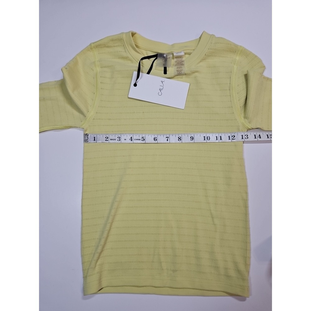 Calia Womens Yellow Seamless Short Sleeve Focus Athletic Top Size Small NWT - Picture 9 of 10